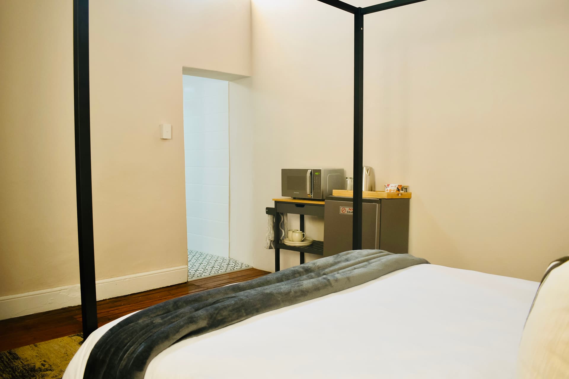 The Blackbox bed to bathroom view